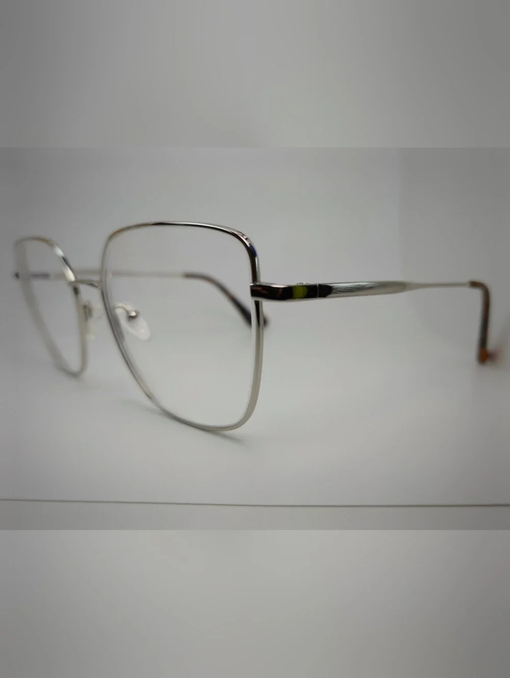 Bessie. Titiaium. Women's Oversized Square Metal Frame Glasses in Chrome.